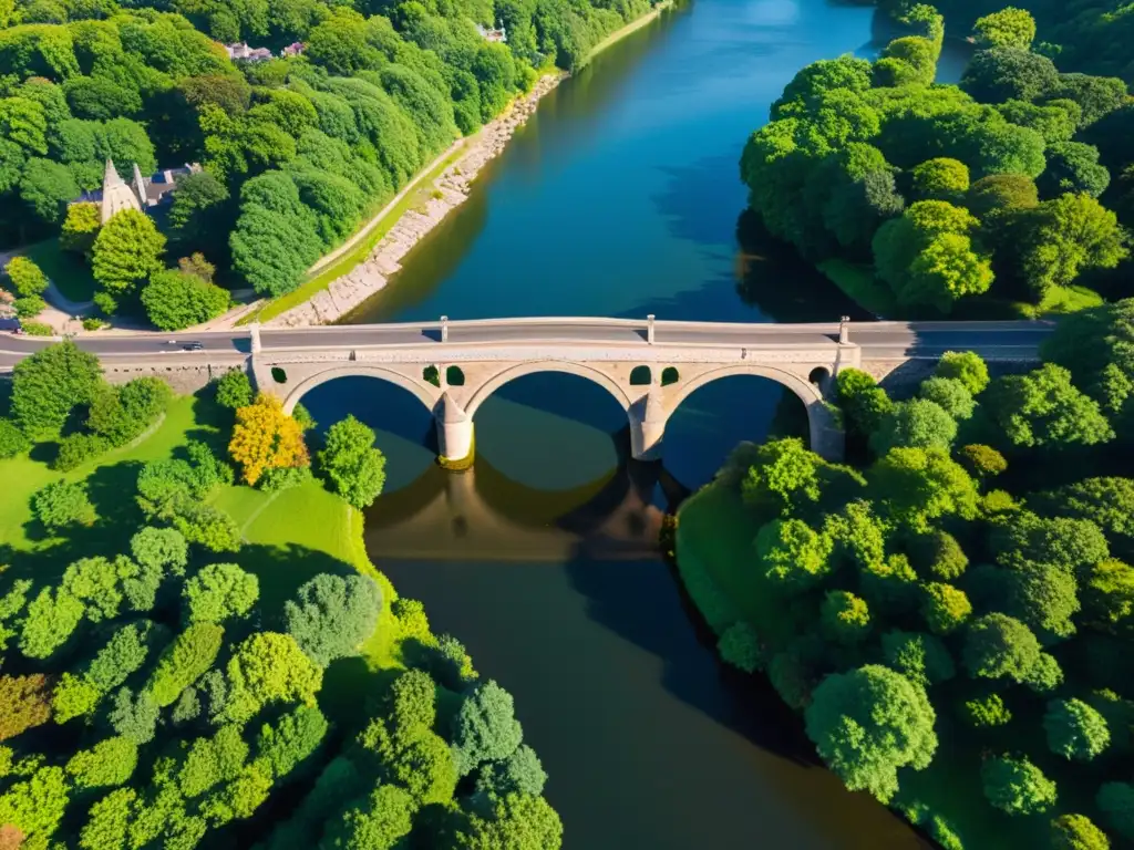 Imagen aérea de un puente histórico con detalles arquitectónicos y paisaje circundante