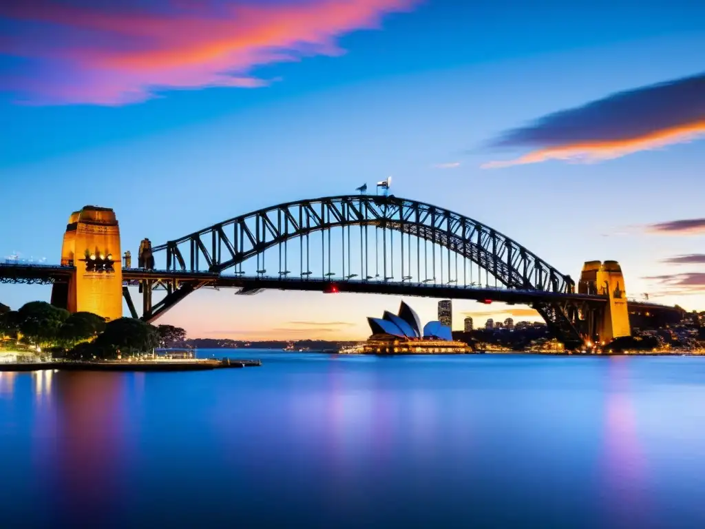 El Puente de la Bahía de Sídney se alza majestuoso durante un vibrante atardecer, reflejando grandiosidad e historia