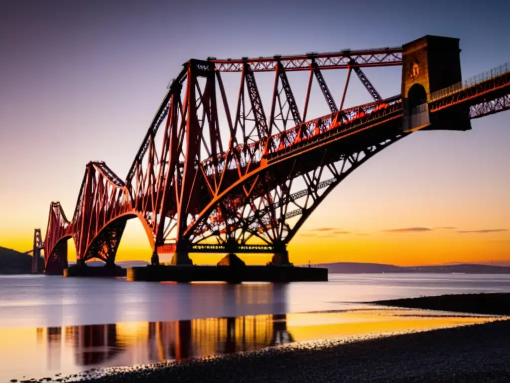 El sol se pone sobre el imponente Puente de Forth, destacando su estructura de acero rojo y su ingeniería victoriana